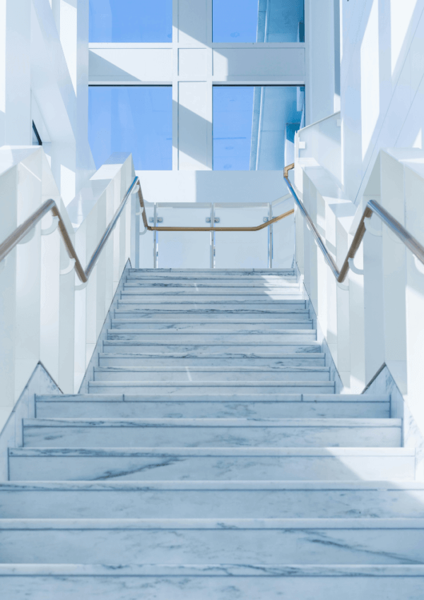 stairs to demonstrate knee pain walking down the stairs