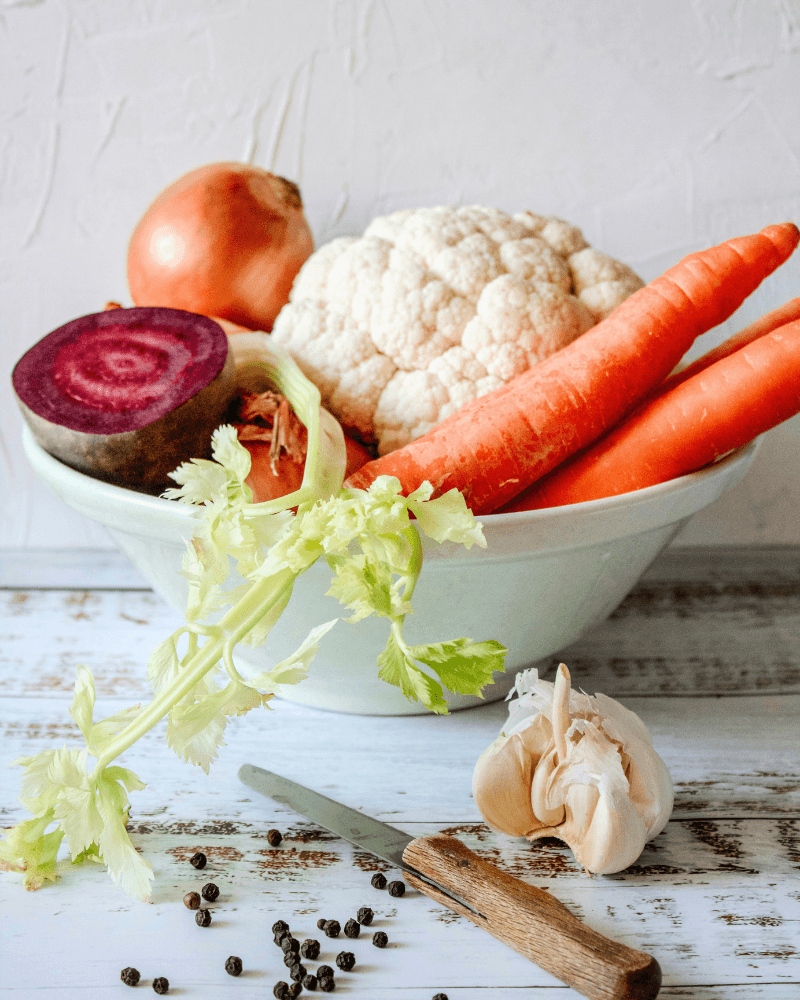 a bowl of vegetable for women's longevity